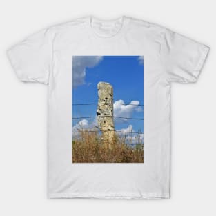 Stonepost fence with grass and blue sky in Kansas. T-Shirt